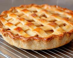 Freshly baked apple pie with a lattice crust photo