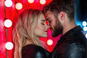 romantic couple embracing in front of colorful lights photo