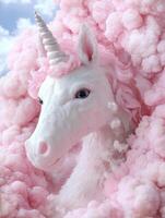 Magical white unicorn in a cloud of pink smoke photo