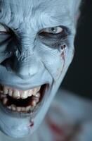 Frightening close up of a creepy monster face photo