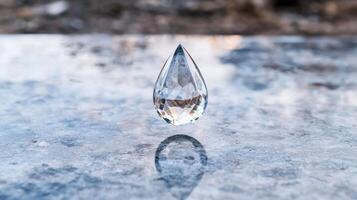 Sparkling crystal gem floating on water photo