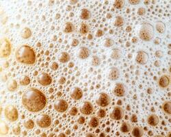 Macro shot of beer foam and bubbles photo