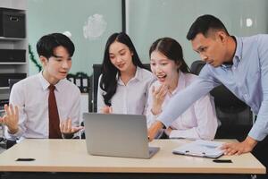 Entrepreneurs and business people conference in modern meeting room, happy multiracial coworkers have fun cooperating working together at office meeting, asian teamwork concept photo