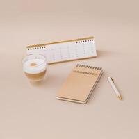 Trendy layout with calendar, planner, coffee and pen on beige background. Planner for organization and goal priorities. Writing down tasks and schedule reminders on office desk. Minimal concept. photo