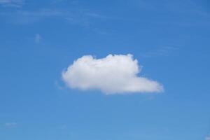Blue sky background with tiny clouds, Nature cloud blue sky background, Blue Sky with Fluffy White Clouds on a Sunny Summer Day photo