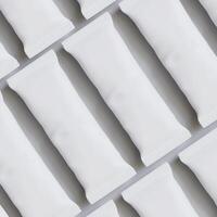 White paper packaging on a gray background photo