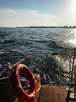 Serene boat ride overlooking the shimmering ocean horizon photo