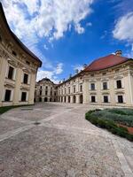 Stunning architectural view of a historic European courtyard in Slavkov u Brna, Czech Republic. photo