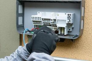 Cleaning and Maintenance of Solar Energy Inverter Equipment. photo