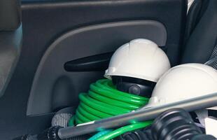 Cleaner manwith your tools. Conceptual image of car washing job. photo