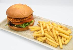 Gourmet American-Style Breaded Chicken Burger and Fries photo
