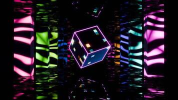Vibrant cube illuminated in a kaleidoscopic space with colorful reflections video