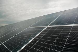 Solar panels reduce your dependence on grid electricity, which can significantly lower your monthly power bills. photo
