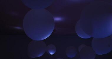 Changing light creates dynamic effects on white balloons attached to a ceiling, enhancing the festive atmosphere indoors video