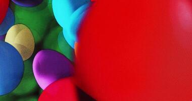 Colorful balls move slowly, showcasing a captivating glitch effect that adds a dynamic and vibrant touch to the scene video