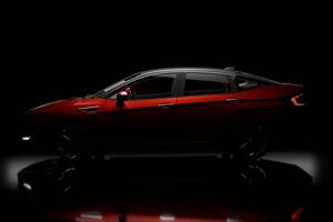 side view of vintage car in black studio lighting photo