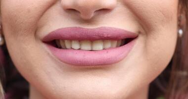 Smiling mouth in close-up. lips smiling in closeup. video