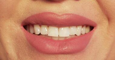 Smiling mouth in close-up. lips smiling in closeup. video