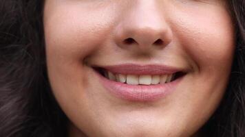 Smiling mouth in close-up. lips smiling in closeup. video