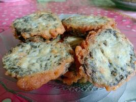 Lots of vegetables on the plate. Vegetarian food with fried vegetables. photo