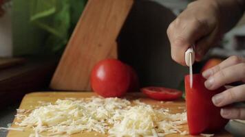Slices of cheddar and colby cheese disappearing from a stack on a cutting board, stop motion animation video