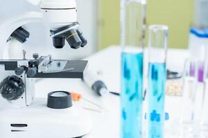 Scientist analyze biochemical samples in advanced scientific laboratory. Medical professional use microscope look microbiological developmental of viral. Biotechnology research in science lab. photo