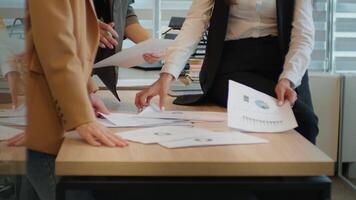 Team of three best workers brainstorming strategy for new release in office. video