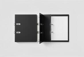 Blank black ring binder folder design mock up top view, 3d rendering. Self-binder mockup with stack of a4 paper. Office supply cardboard folder branding presentation. Desk lever arch file photo