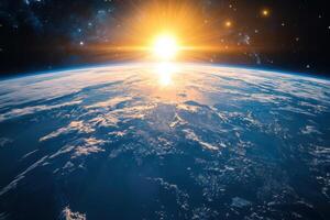 Sunrise over Earth from space, with bright sunlight and stars. photo