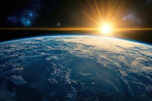 Sunrise over Earth from space, showing clouds and a starry sky. photo