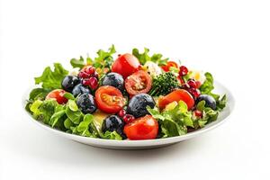 A salad with berries, tomatoes and lettuce photo