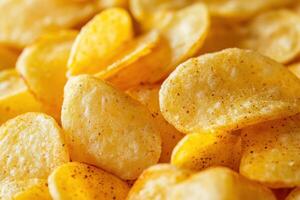 Close up of a pile of crispy potato chips. photo