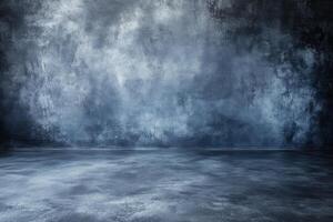 An empty room with a dark concrete wall photo