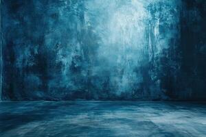 A dark blue concrete room with a light in the center. photo