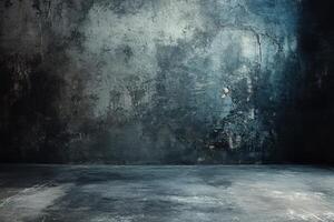 Dark, empty room with textured concrete walls and floor. photo