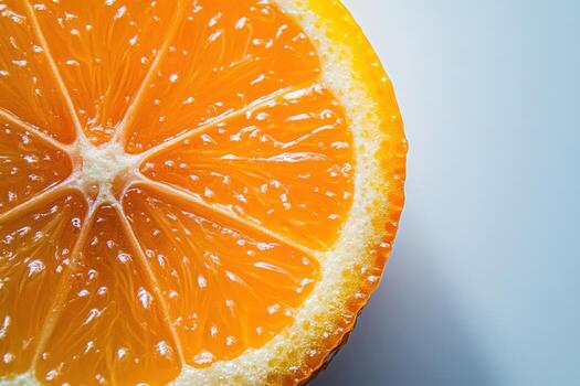 Close-up of a juicy orange slice with visible segments and a white background. photo