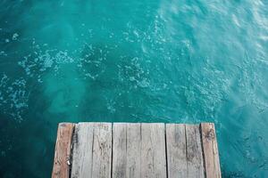 A wooden dock in the middle of the ocean photo
