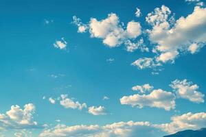 Bright blue sky with fluffy white clouds. photo