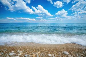 A beach with waves and blue sky photo