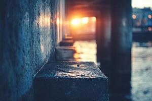 Closeup of concrete bridge support at sunset. photo