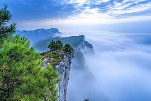 Majestic mountain peak with clouds below. photo