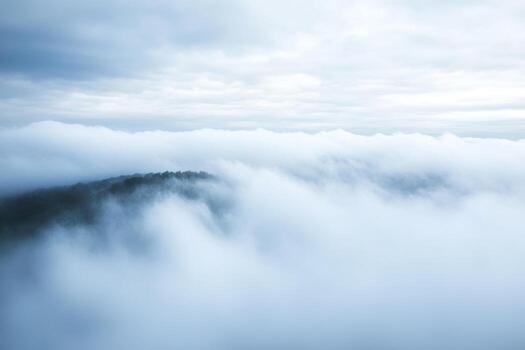 A view of the clouds from above the clouds photo
