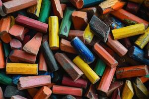 A colorful assortment of chalk sticks, perfect for drawing and creating. photo