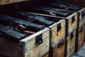 A row of wooden drawers with rifles inside. photo