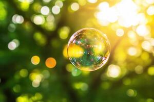 A single iridescent soap bubble floats in front of a blurred background of sunlight through trees. photo