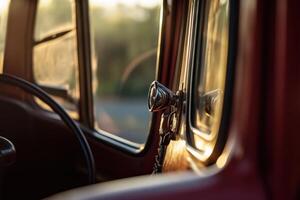 Classic car interior detail with sun reflecting off chrome knob. photo