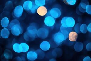 Abstract blue and yellow bokeh lights on a dark background. photo