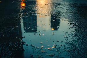 City buildings reflected in a puddle after rain. photo