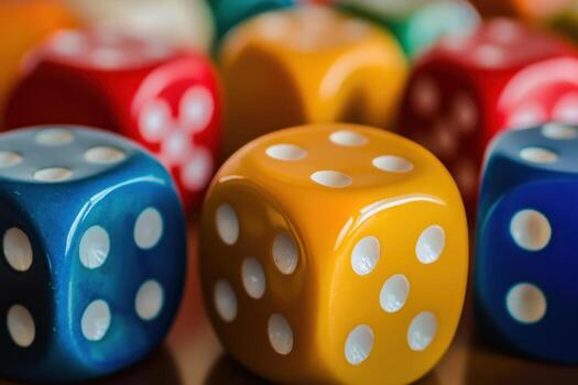 Close-up of colorful dice with white dots. photo