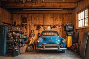A blue vintage car in a cluttered wooden garage. photo